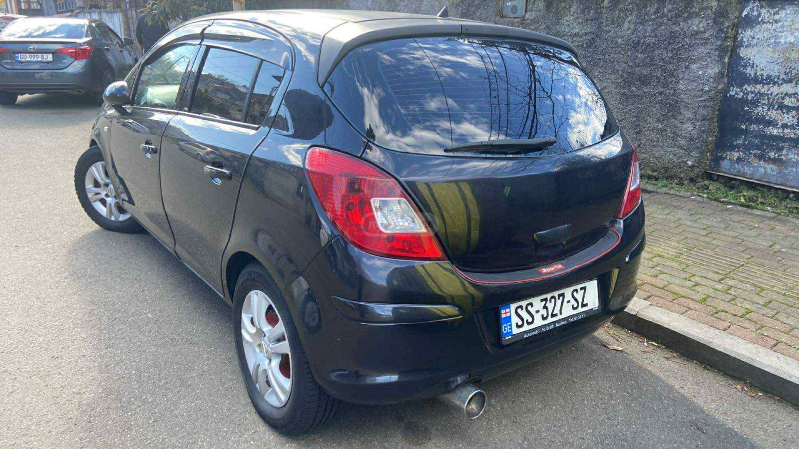 Opel Corsa 2008 — photo 2