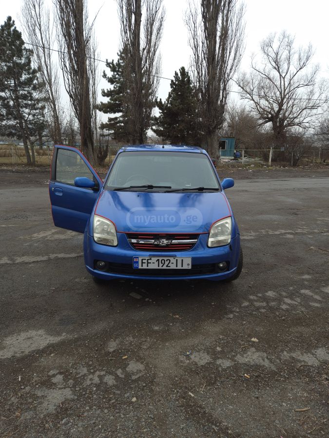 Chevrolet Cruze 2003 — photo 2
