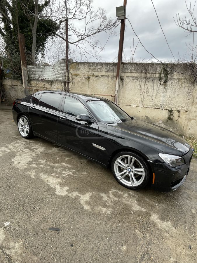BMW 740 2014 — photo 2
