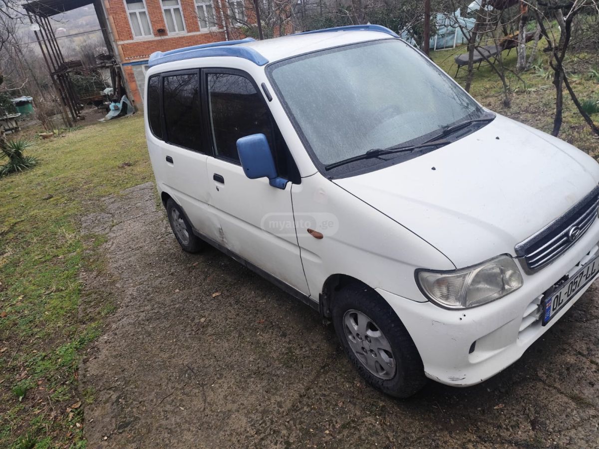 Daihatsu Move 2001 — photo 2