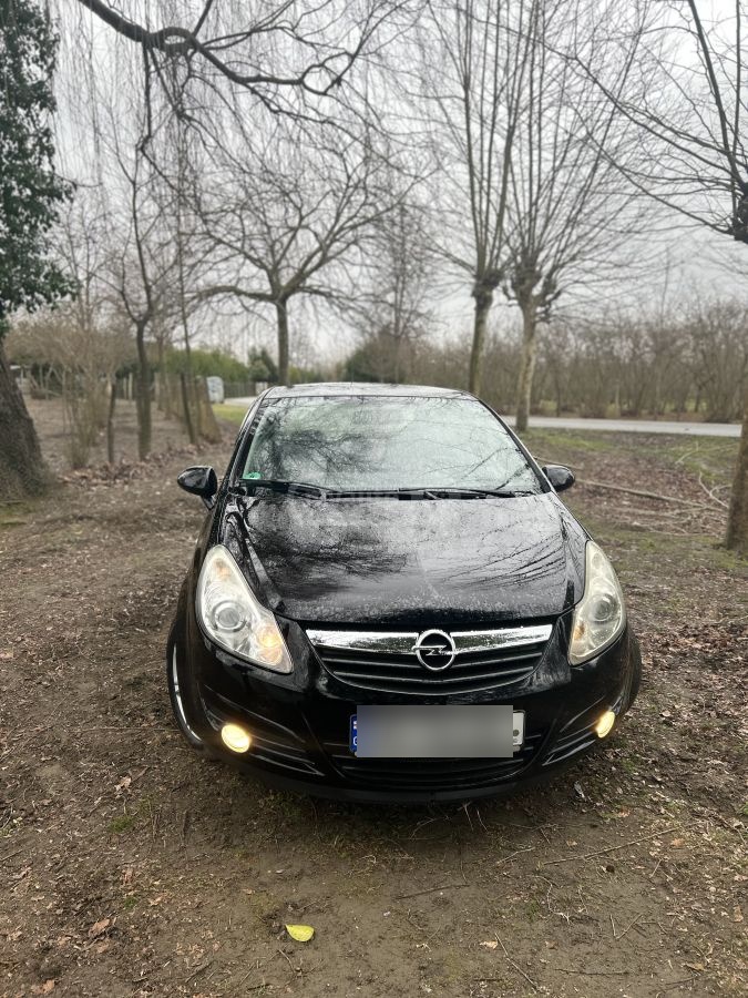 Opel Corsa 2010 — photo 2