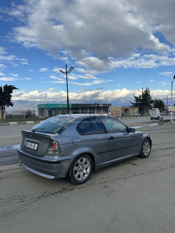 BMW 318 2003 — photo 2