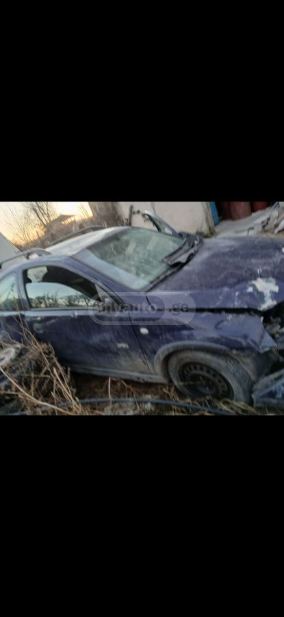 Opel Corsa 2003 — photo 2