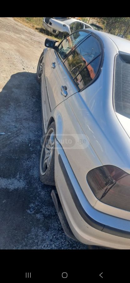 BMW 325 2004 — photo 2