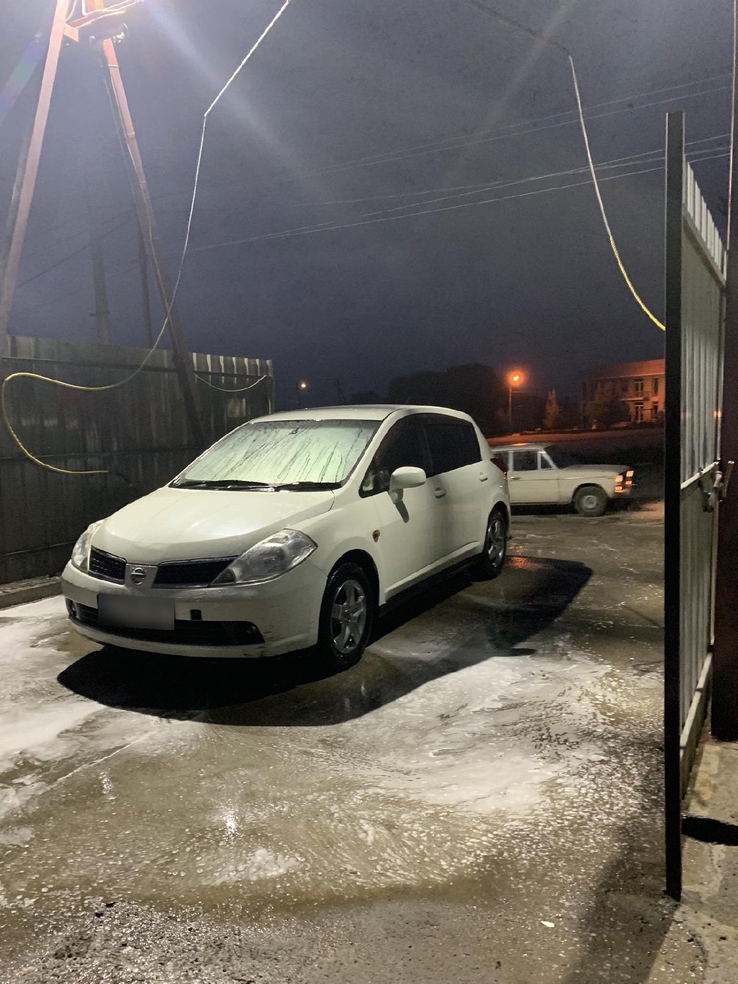 Nissan Tiida 2004 — photo 2