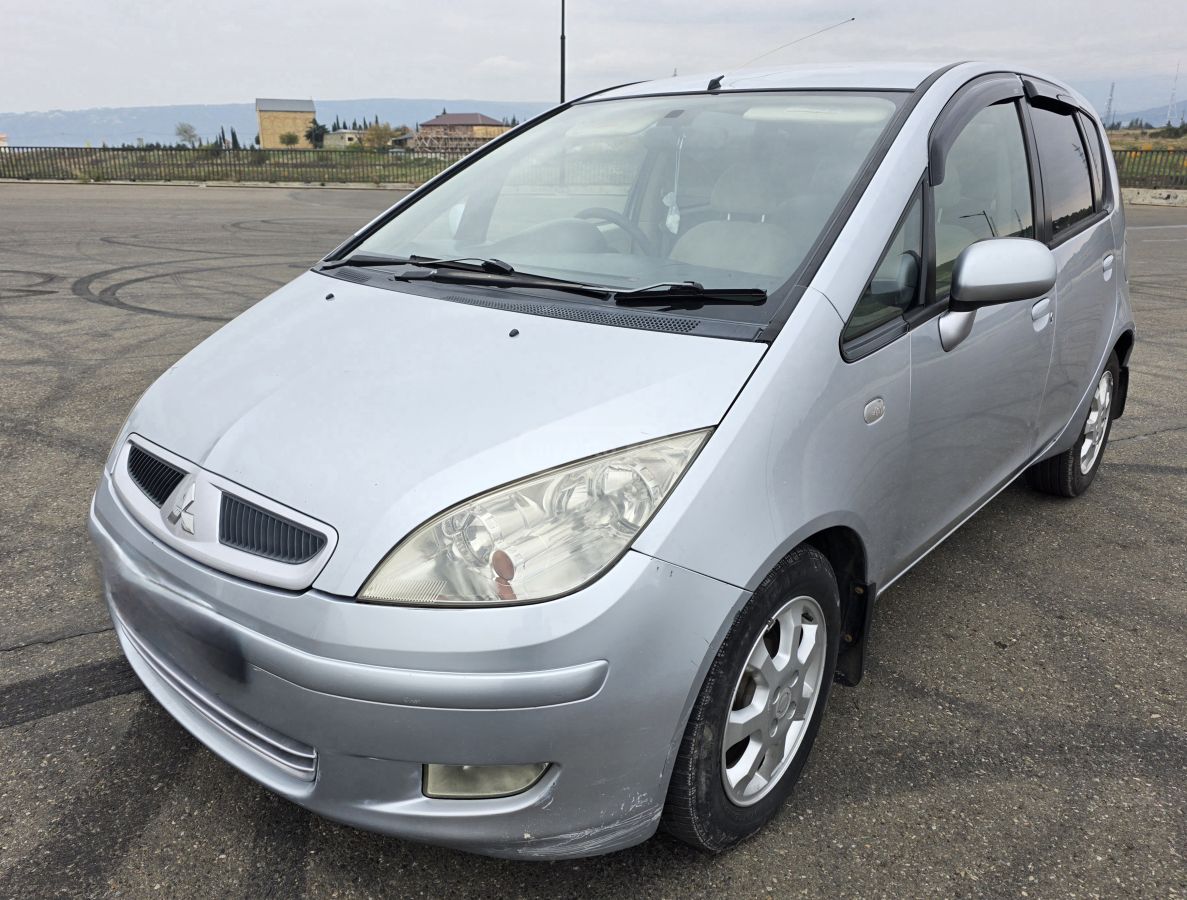 Mitsubishi Colt 2002 — photo 2