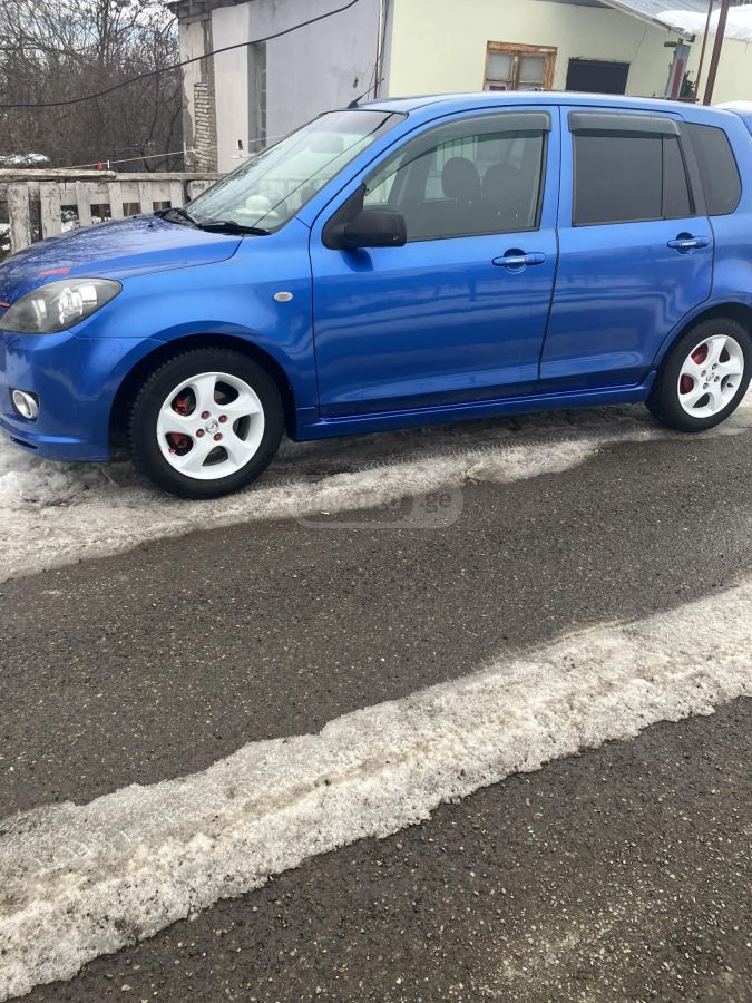 Mazda Demio 2005 — photo 2
