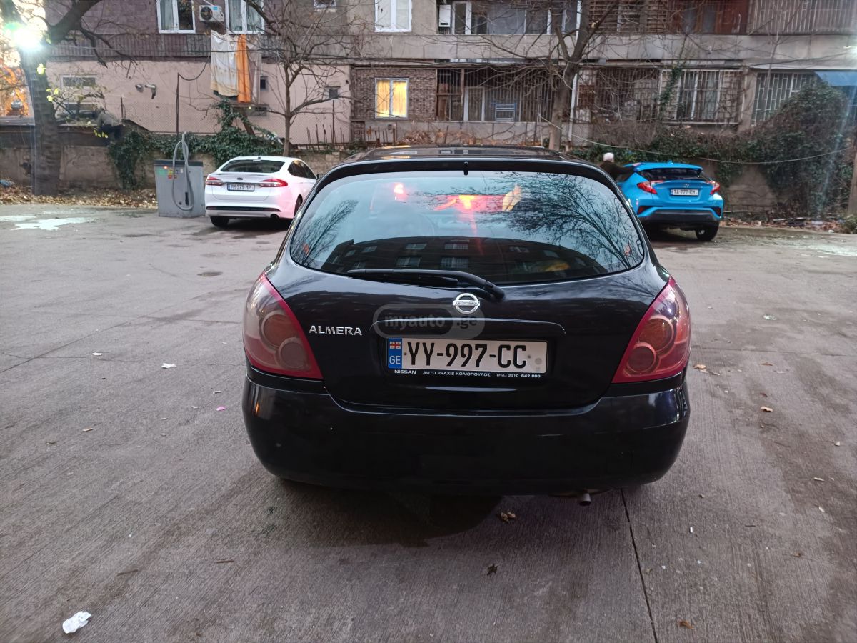 Nissan Almera 2004 — photo 2