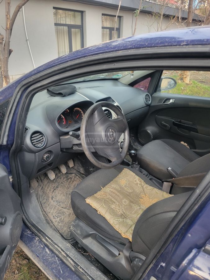 Opel Corsa 2009 — photo 2