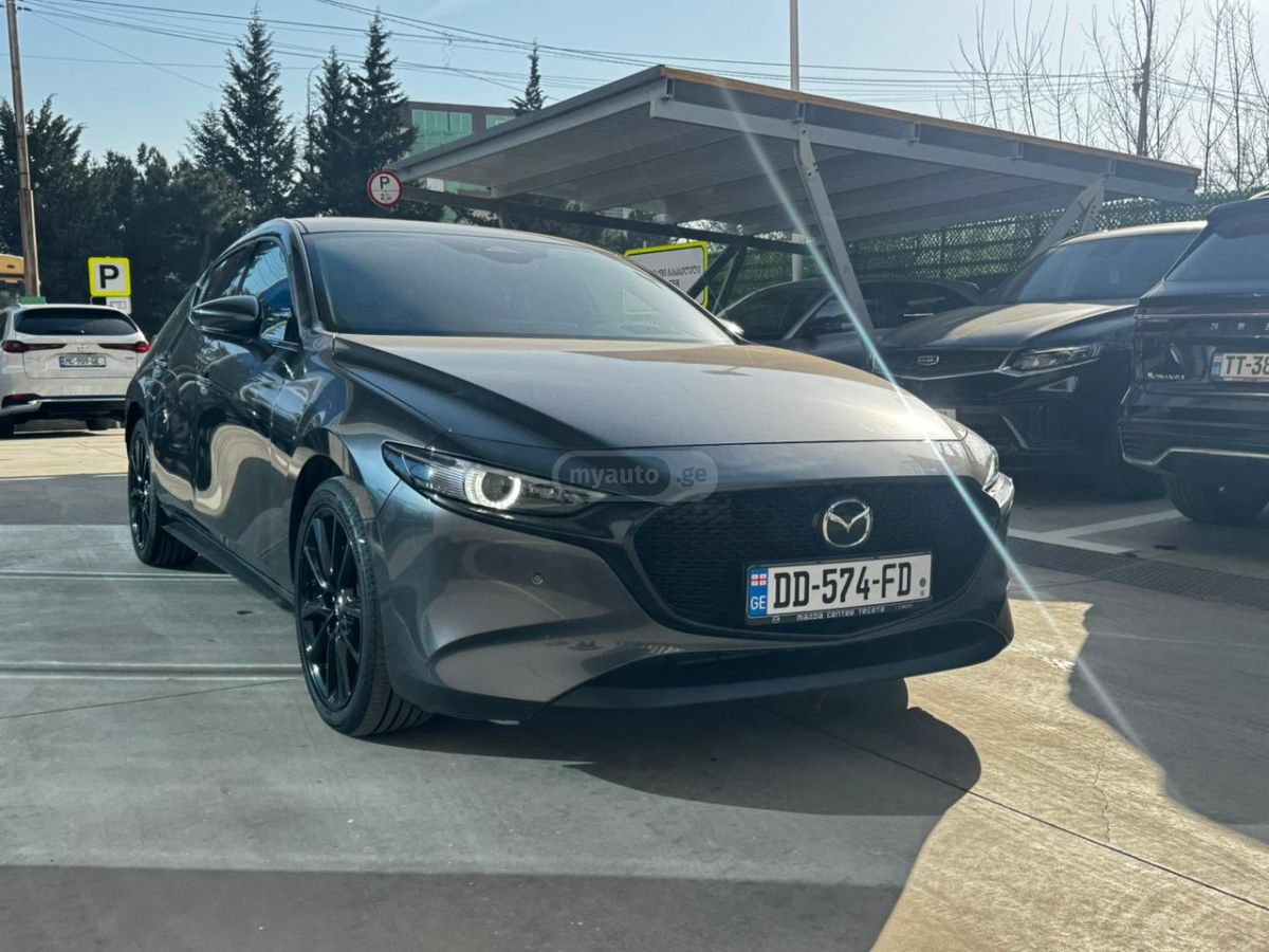 Mazda Mazda3 2024 — photo 2