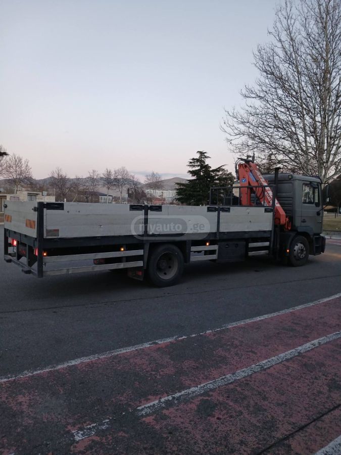 Isuzu 12.210 1997 — photo 2