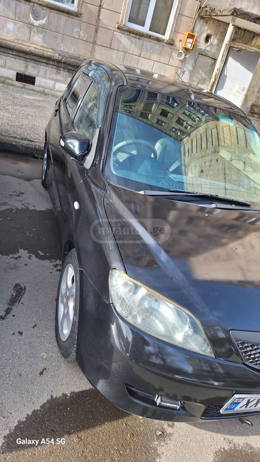 Mazda Demio 2002 — photo 2