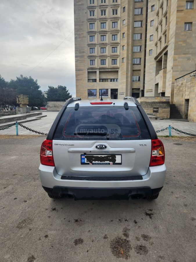 Kia Sportage 2009 — photo 2