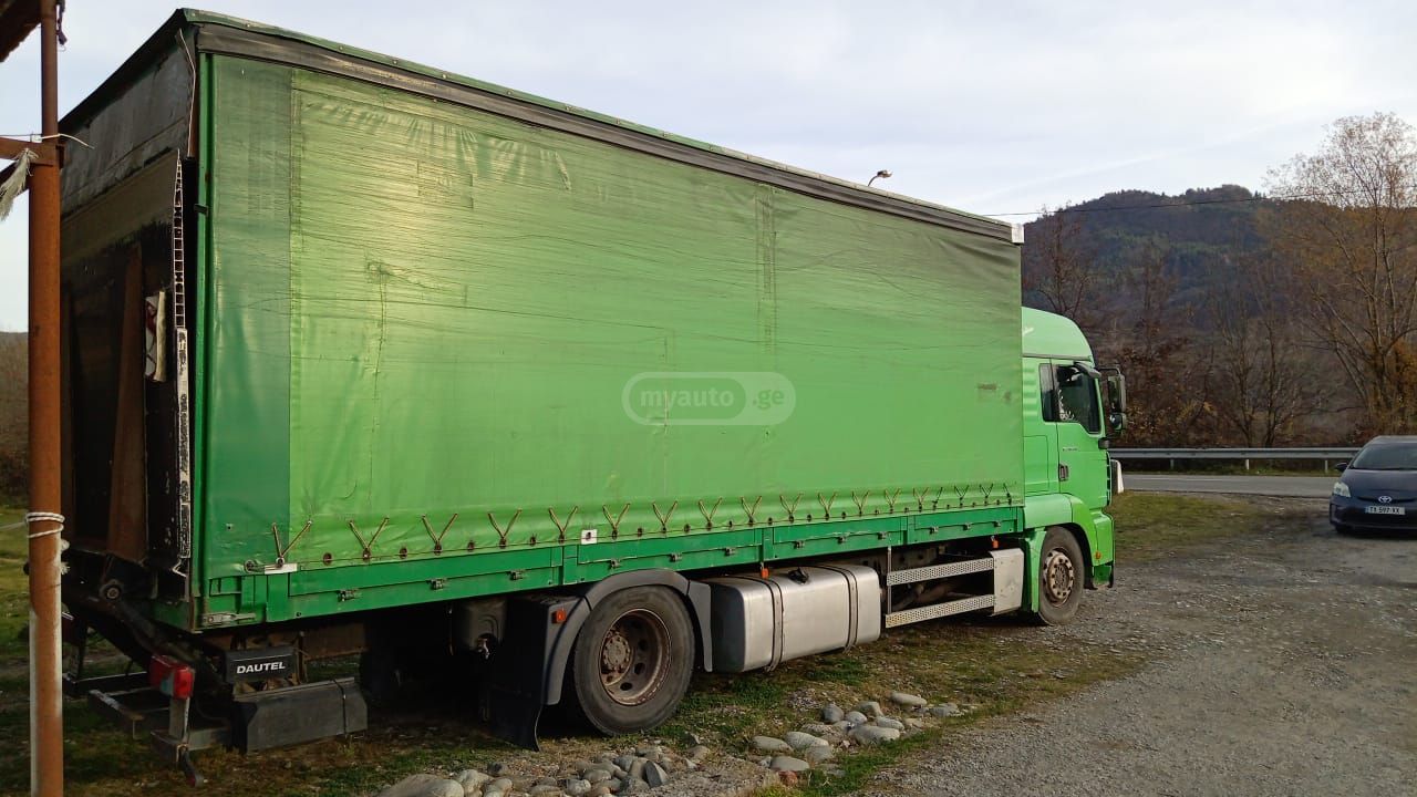 Isuzu TGA 2003 — photo 2
