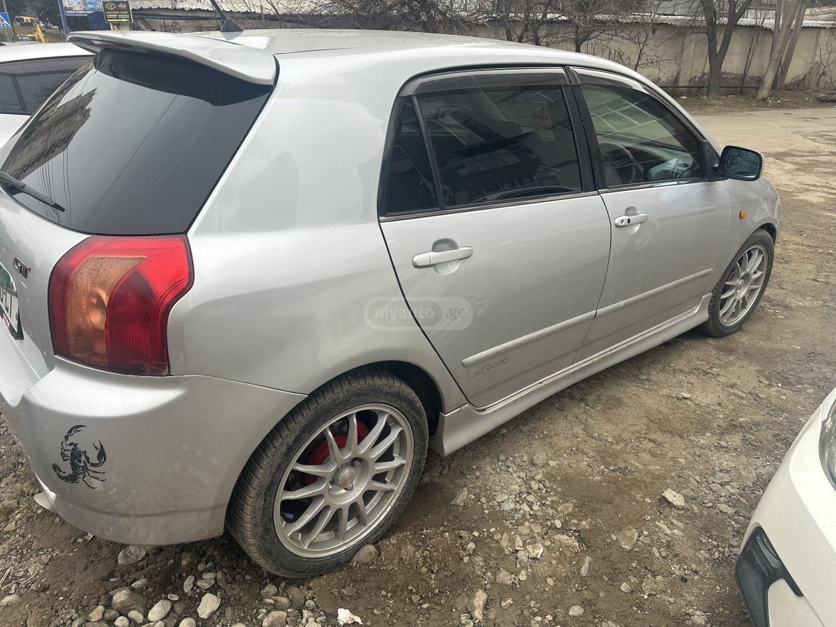Toyota Corolla 2004 — photo 2