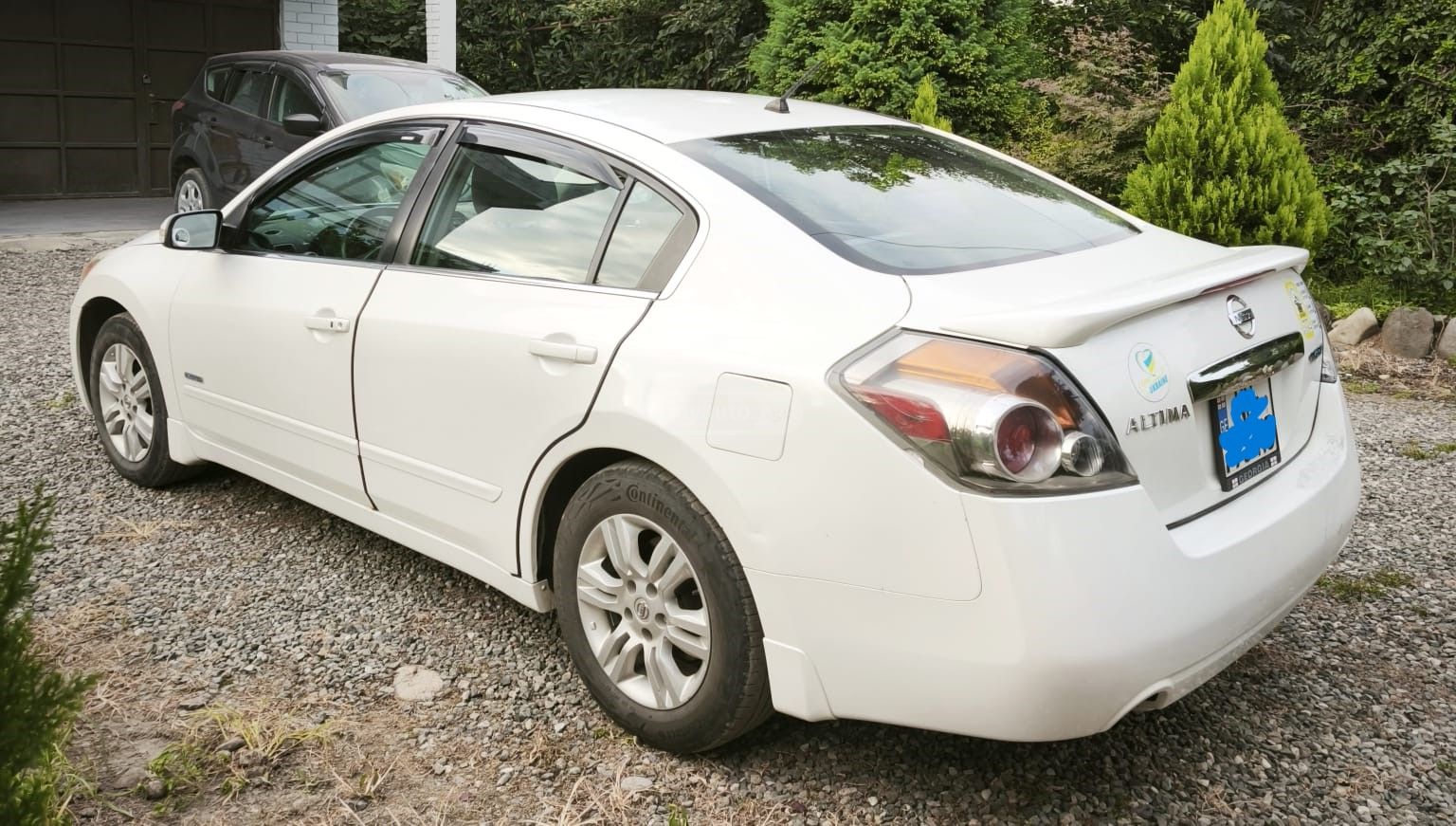Nissan Altima 2010 — photo 2