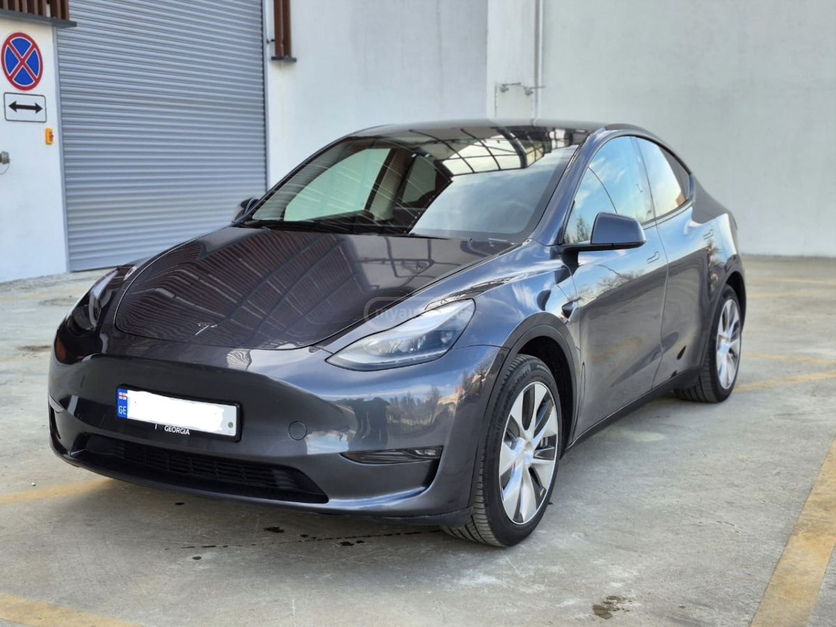 Tesla Model Y 2023 — photo 2