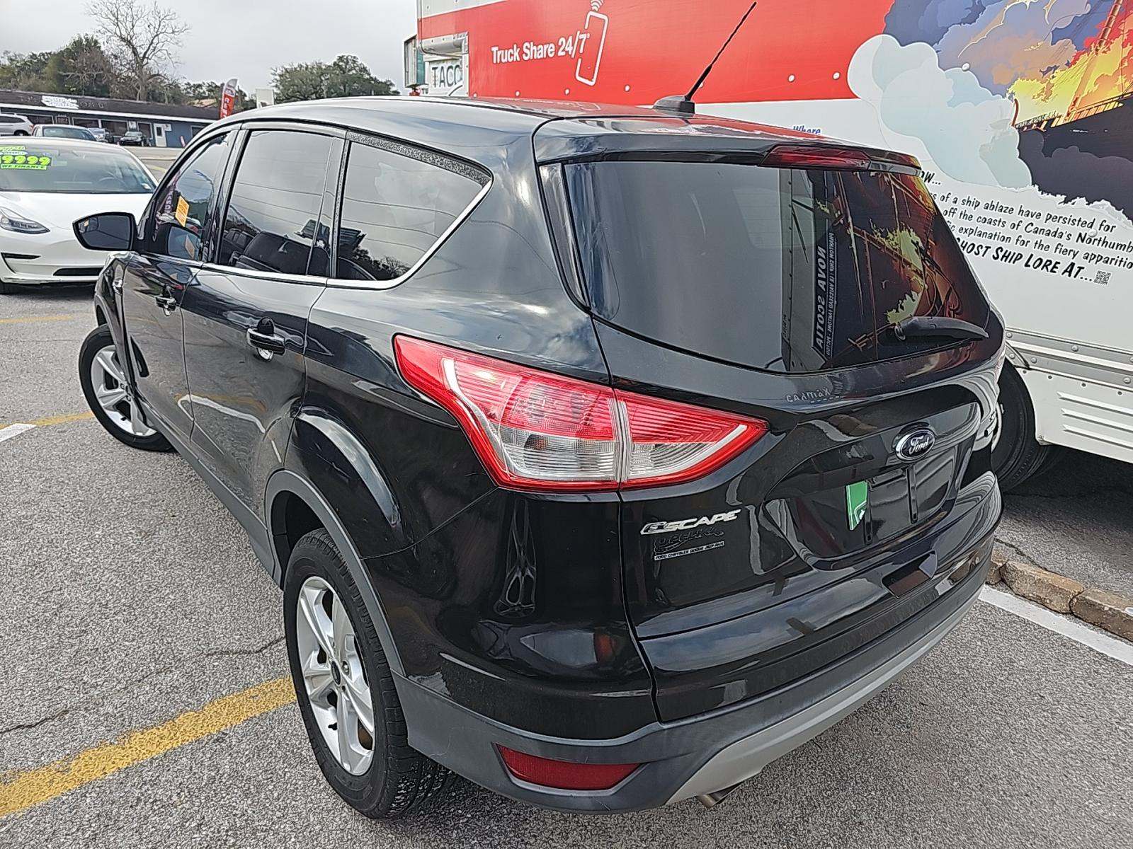 Ford Escape 2014 — photo 2
