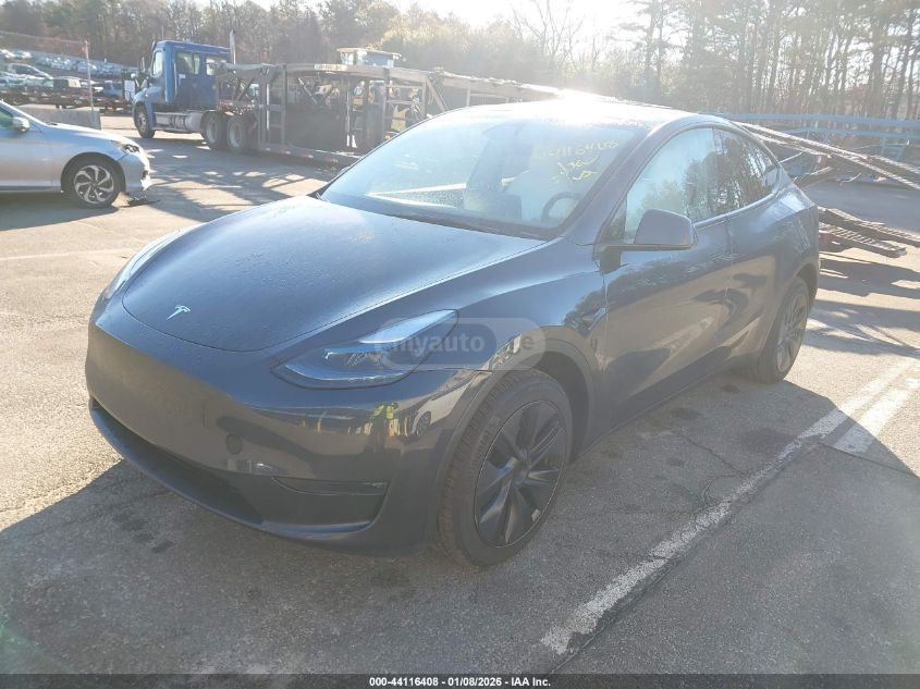 Tesla Model Y 2024 — photo 2