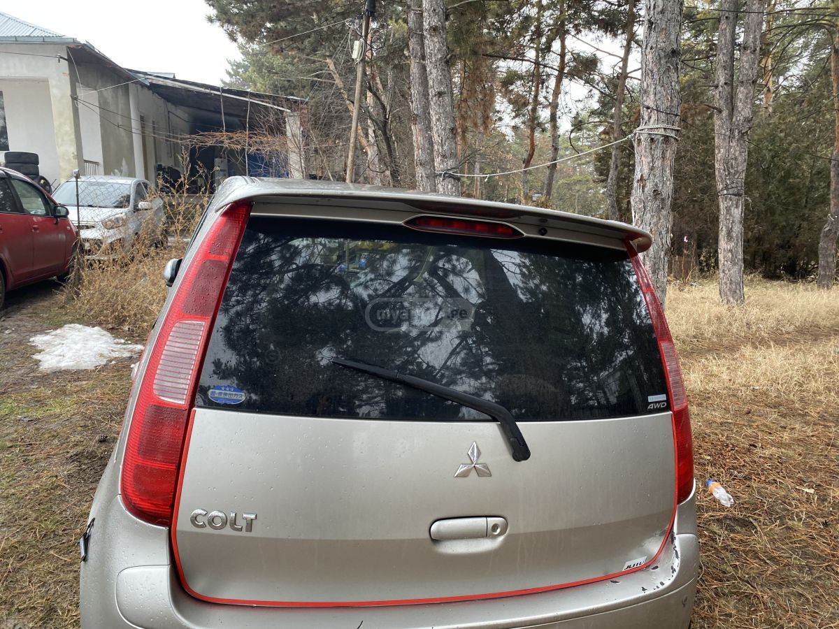 Mitsubishi Colt 2002 — photo 2