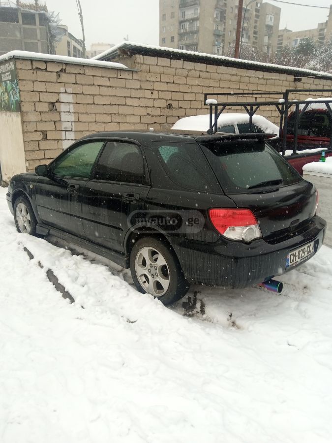 Subaru Impreza 2004 — photo 2