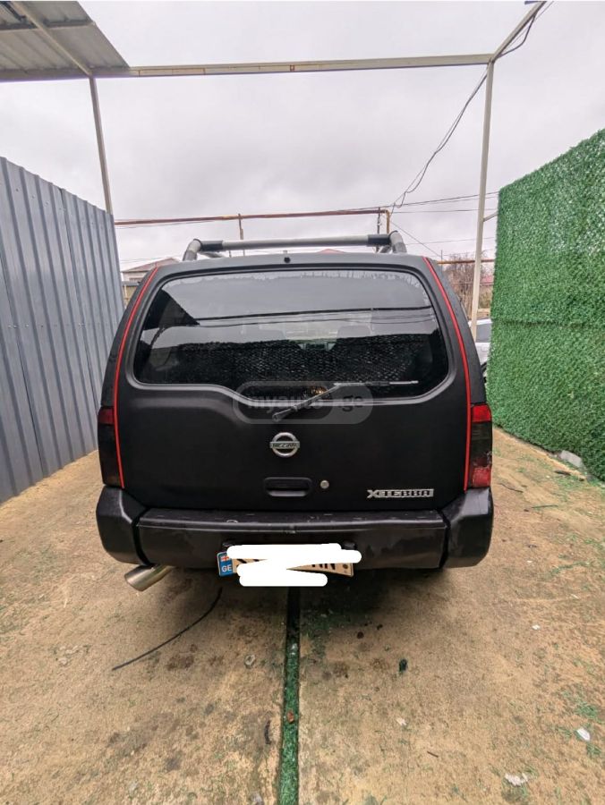 Nissan Xterra 2004 — photo 2