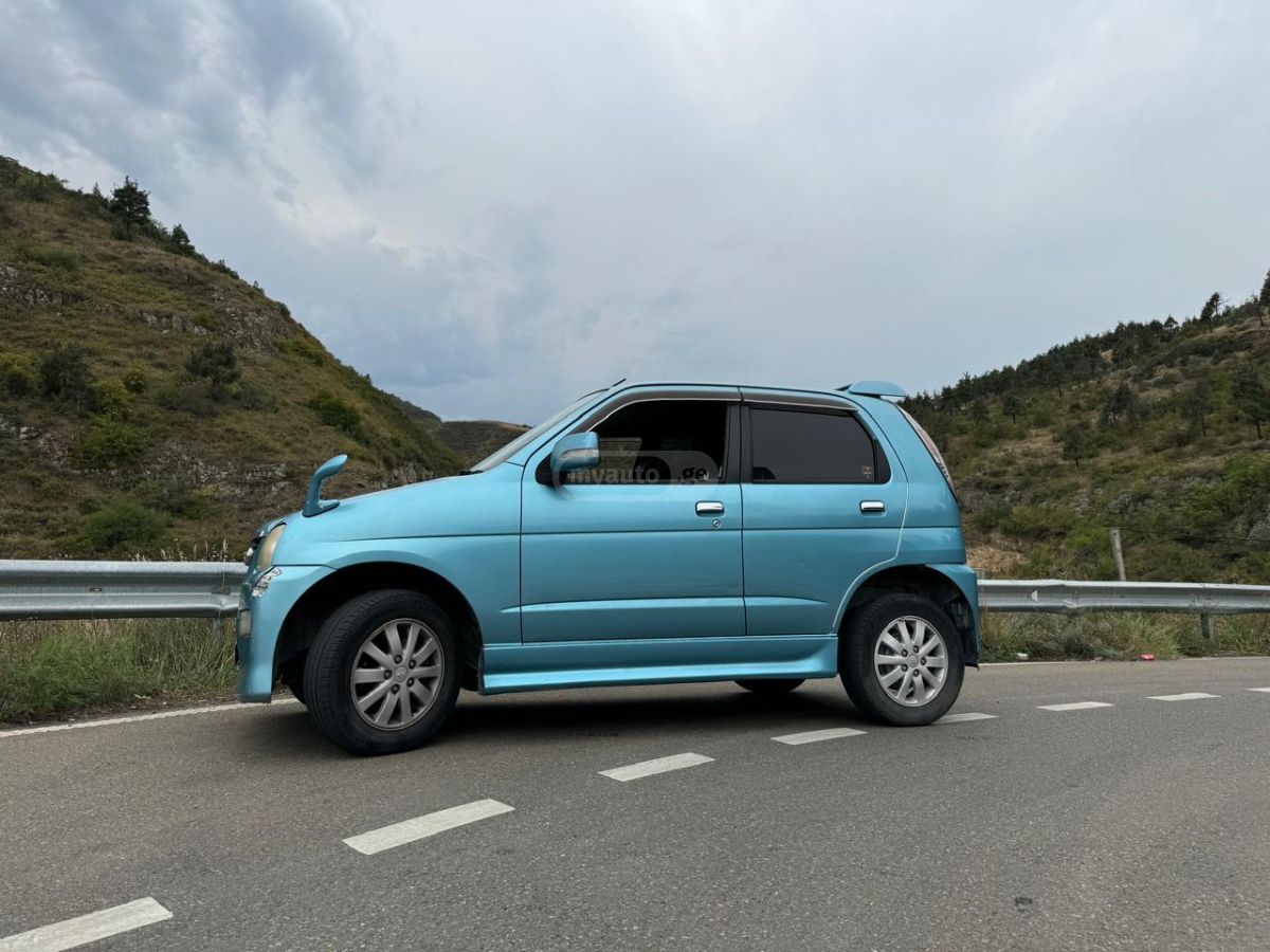 Daihatsu Move 2002 — photo 2