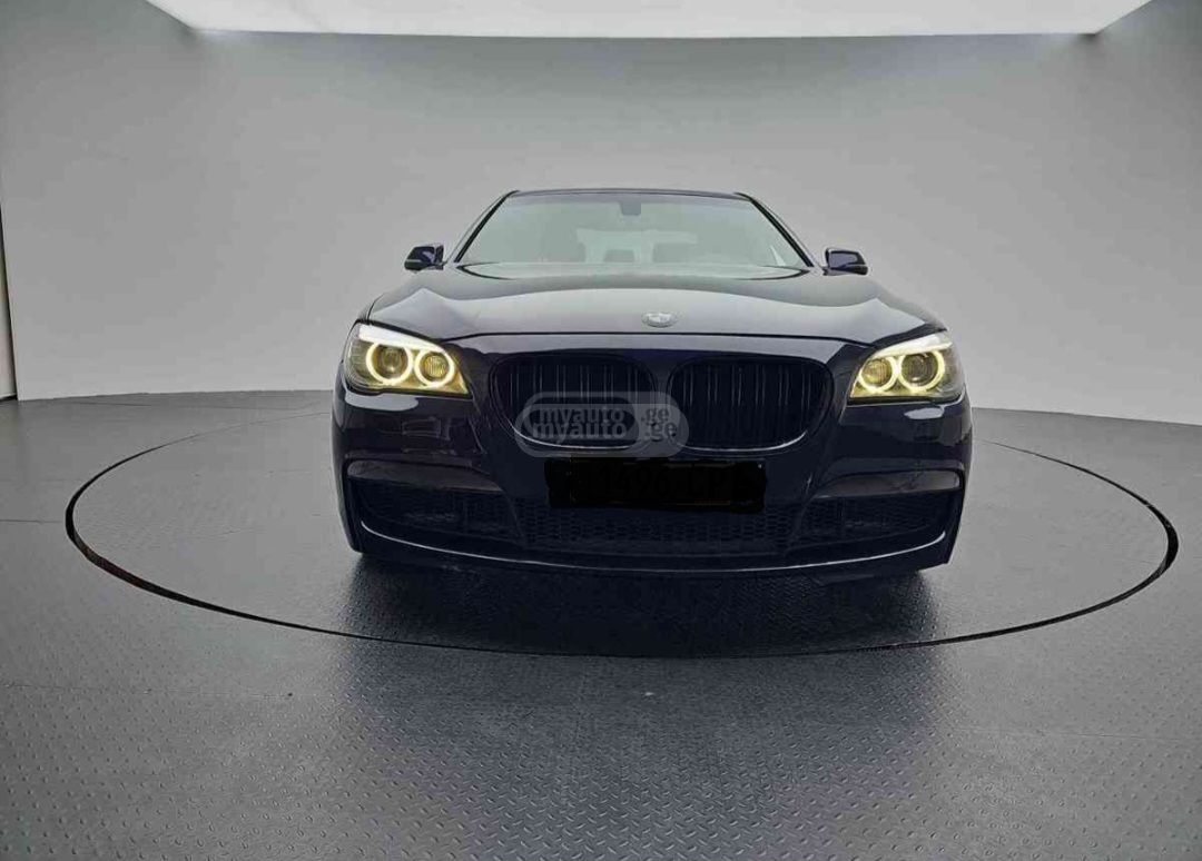BMW 740 2014 — photo 2
