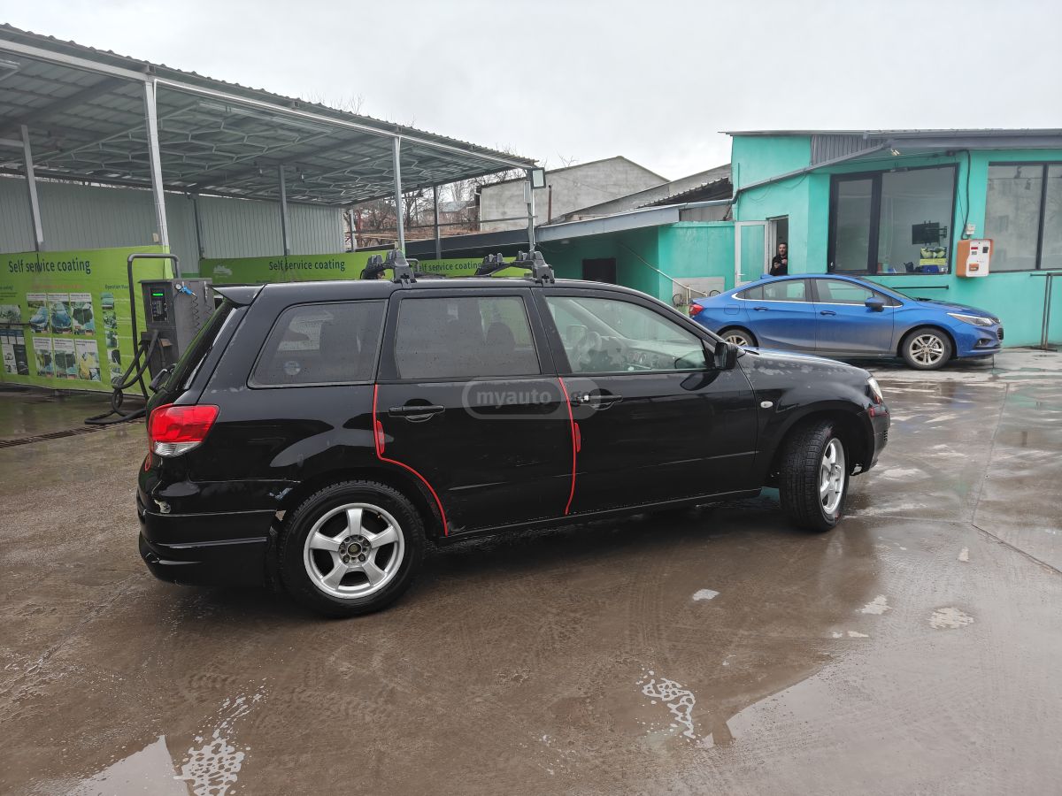 Mitsubishi Airtrek 2002 — photo 2