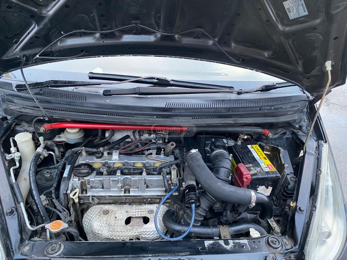 Mitsubishi Colt 2005 — photo 2