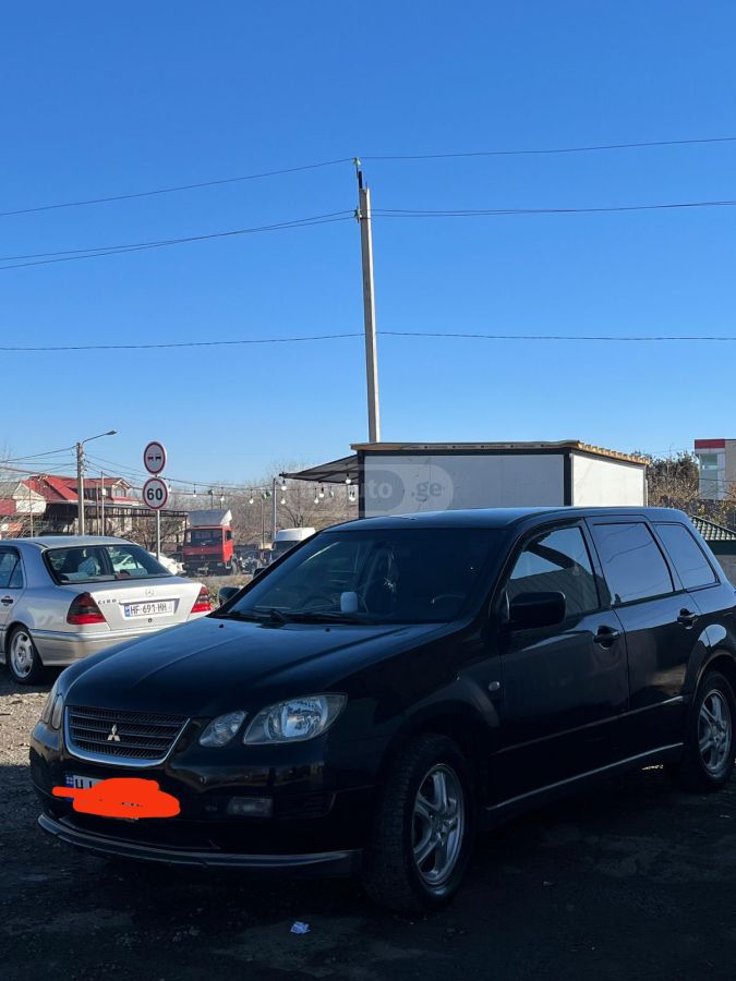 Mitsubishi Airtrek 2002 — photo 2