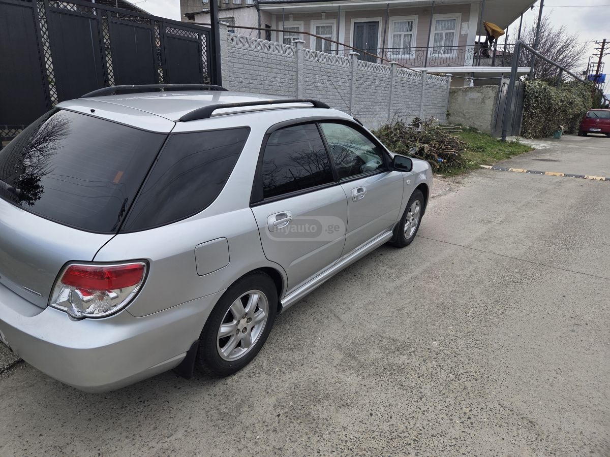 Subaru Impreza 2006 — photo 2