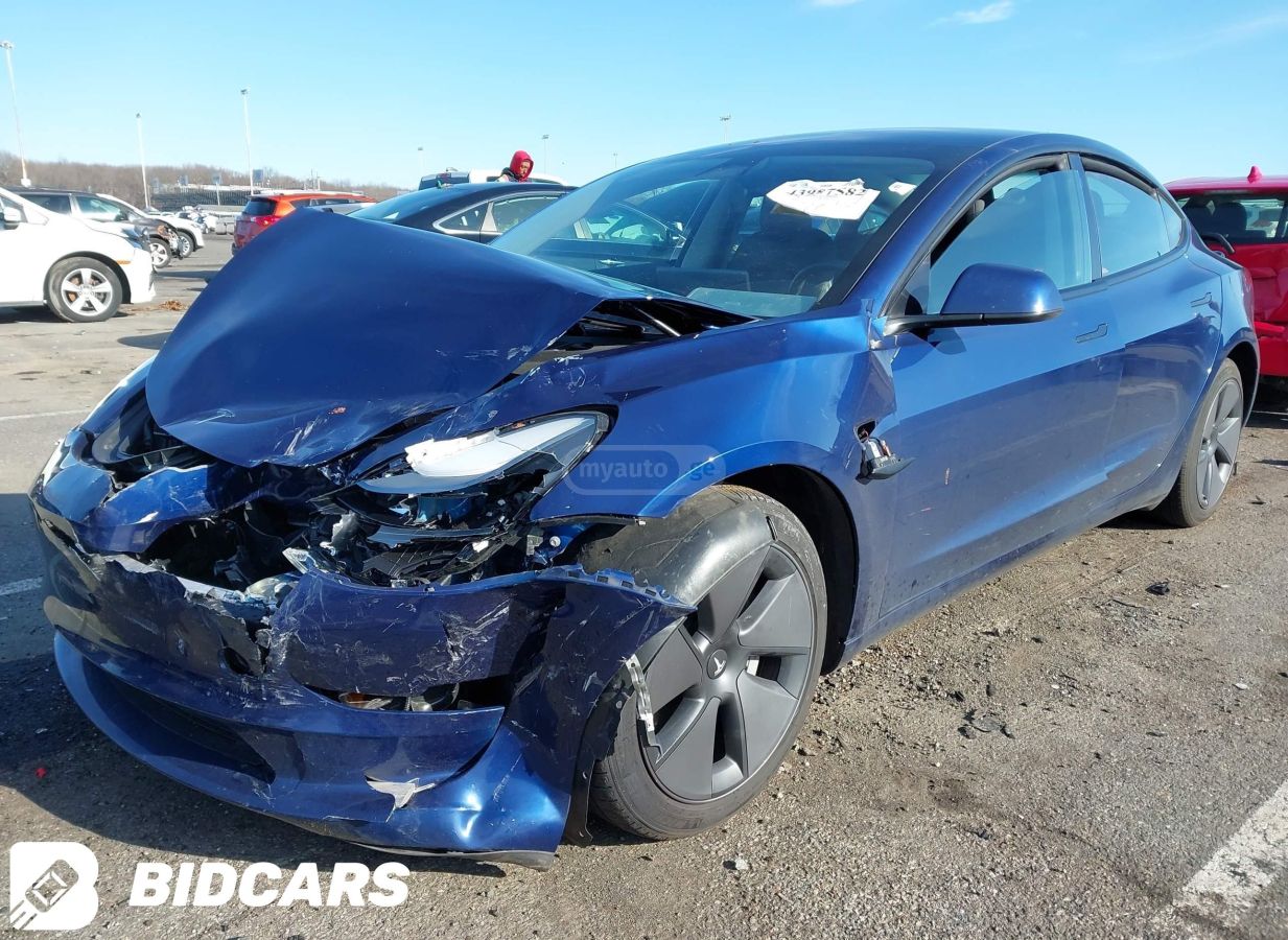 Tesla Model 3 2023 — photo 2