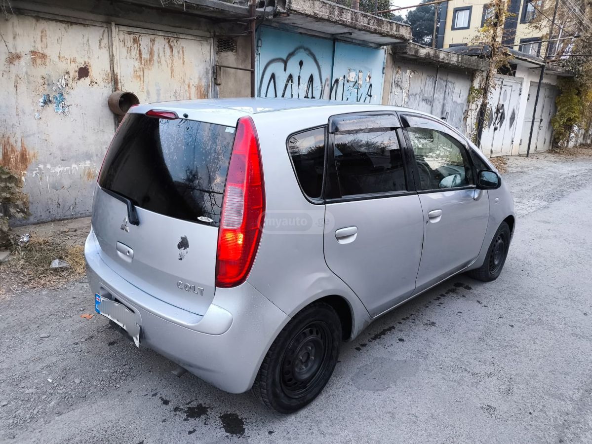 Mitsubishi Colt 2003 — photo 2