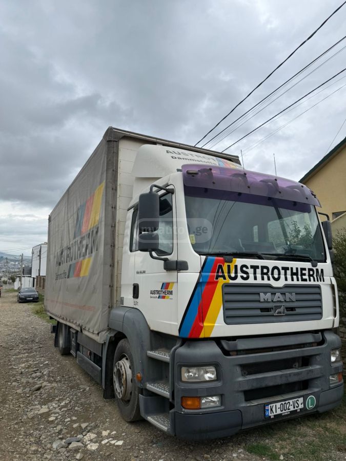 Isuzu TGA 2005 — photo 2