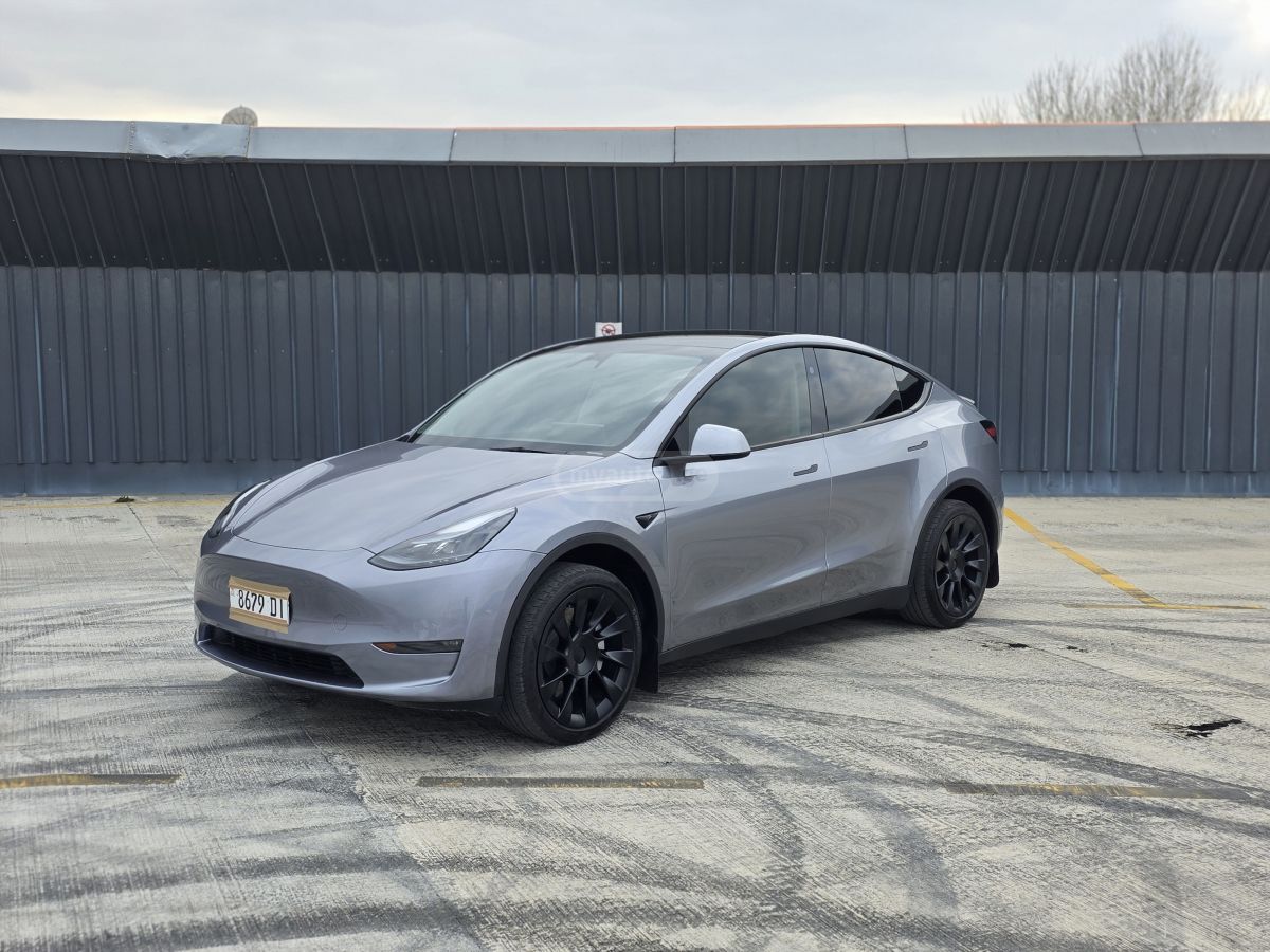 Tesla Model Y 2024 — photo 2