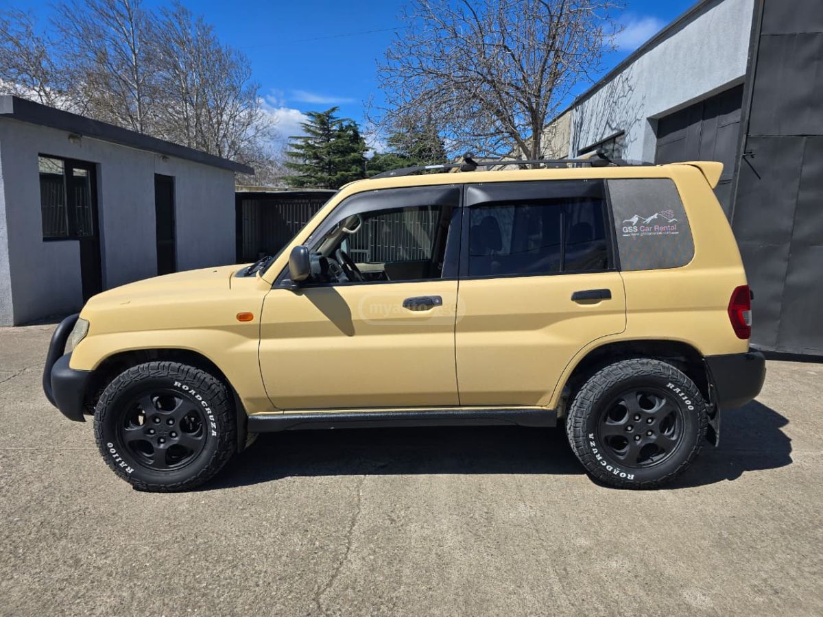 Mitsubishi Pajero IO 2004 — photo 2
