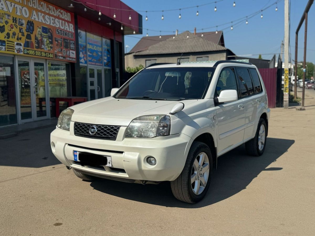 Nissan X-Trail 2005 — photo 2