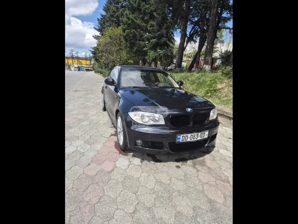 BMW 130 2009 — photo 2
