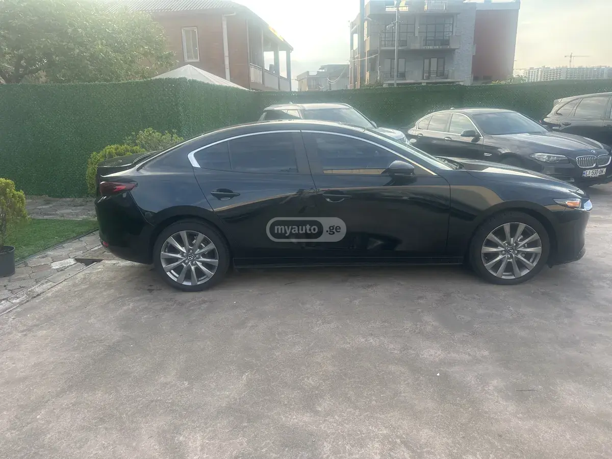Mazda Mazda3 2024 — photo 2