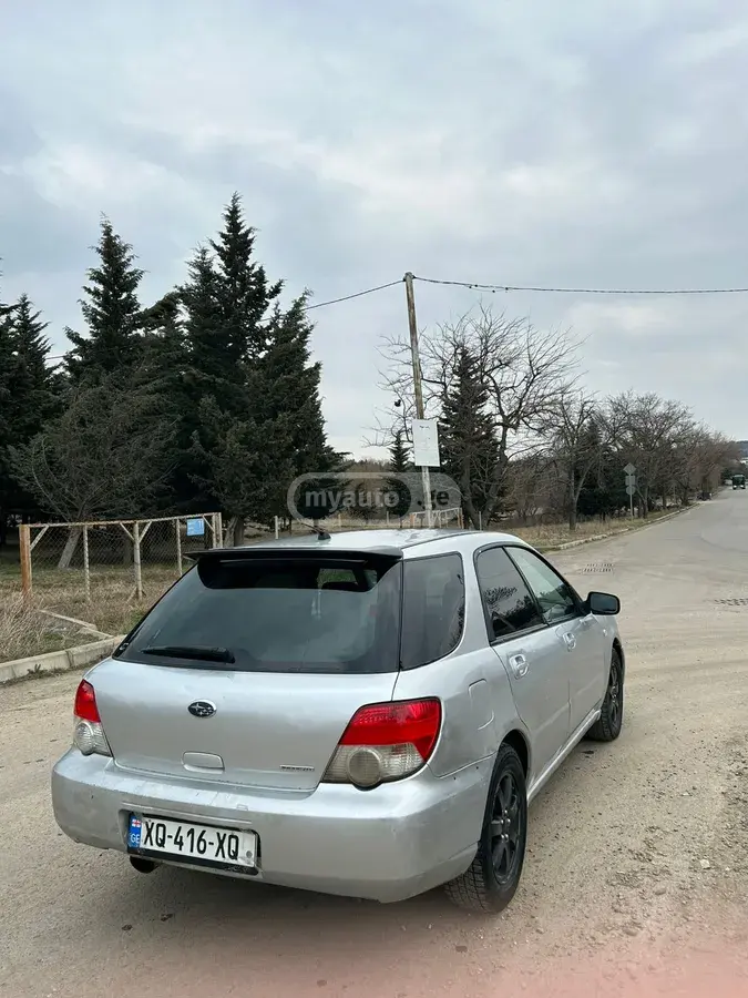 Subaru Impreza 2004 — photo 2