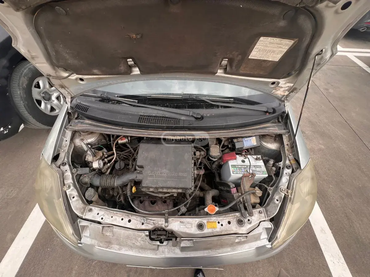 Toyota Passo 2005 — photo 2