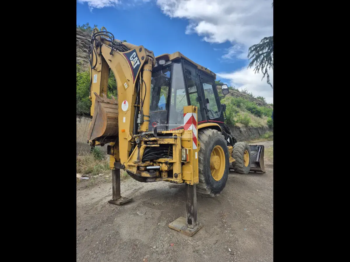 Caterpillar 440 2002 — photo 2
