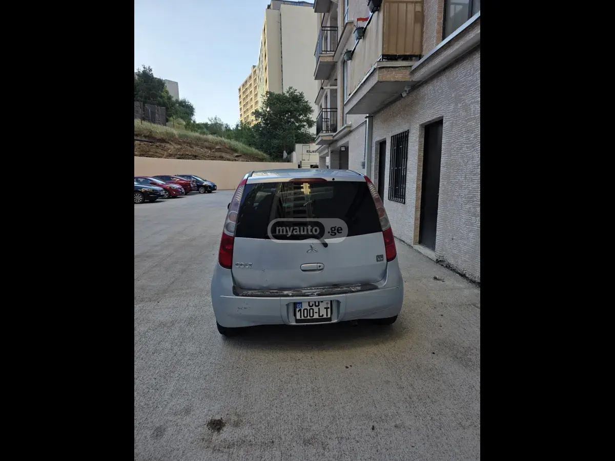 Mitsubishi Colt 2005 — photo 2