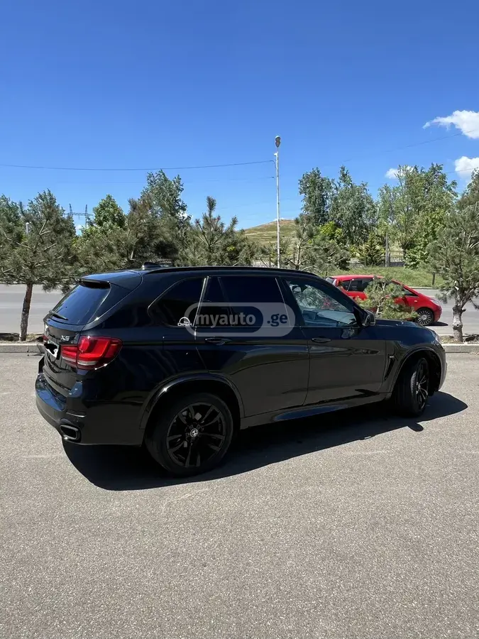 BMW X5 2014 — photo 2