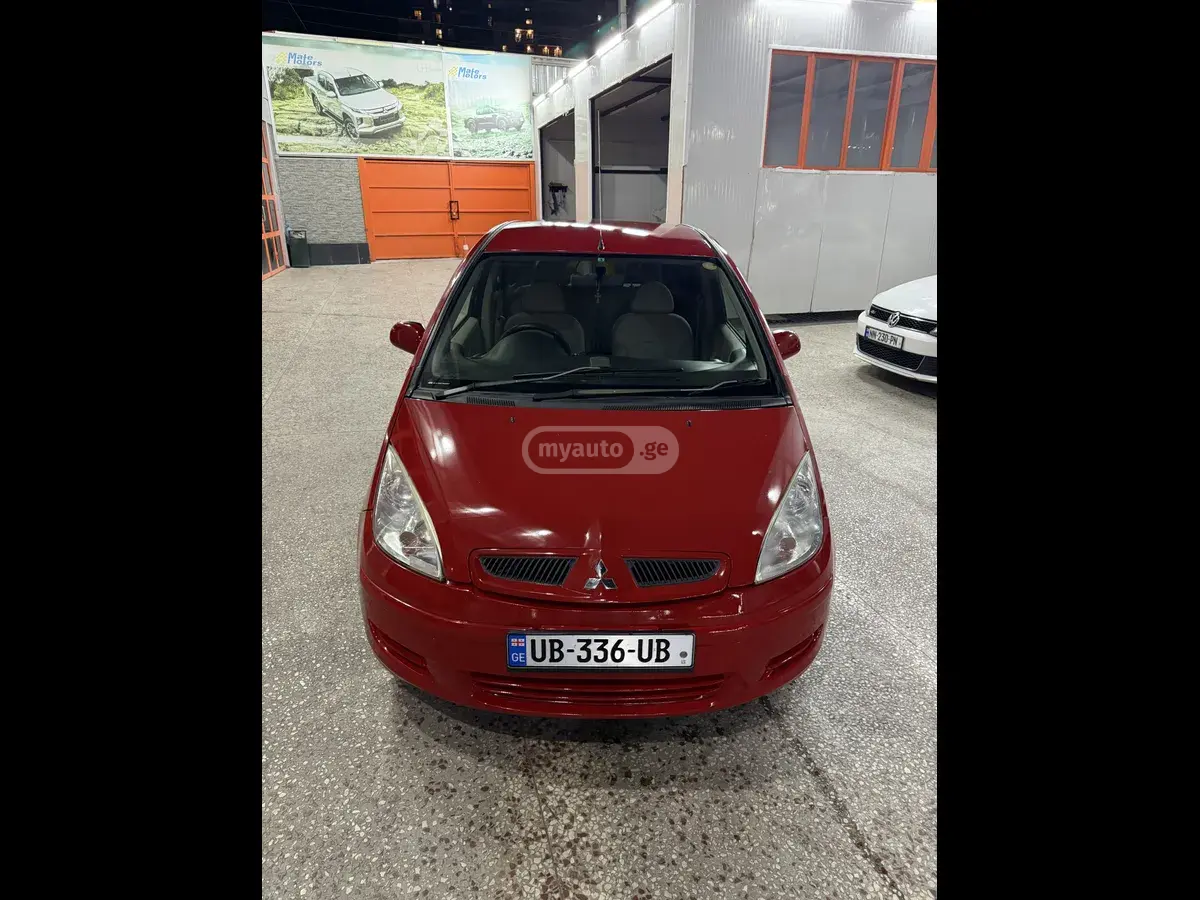 Mitsubishi Colt 2004 — photo 2