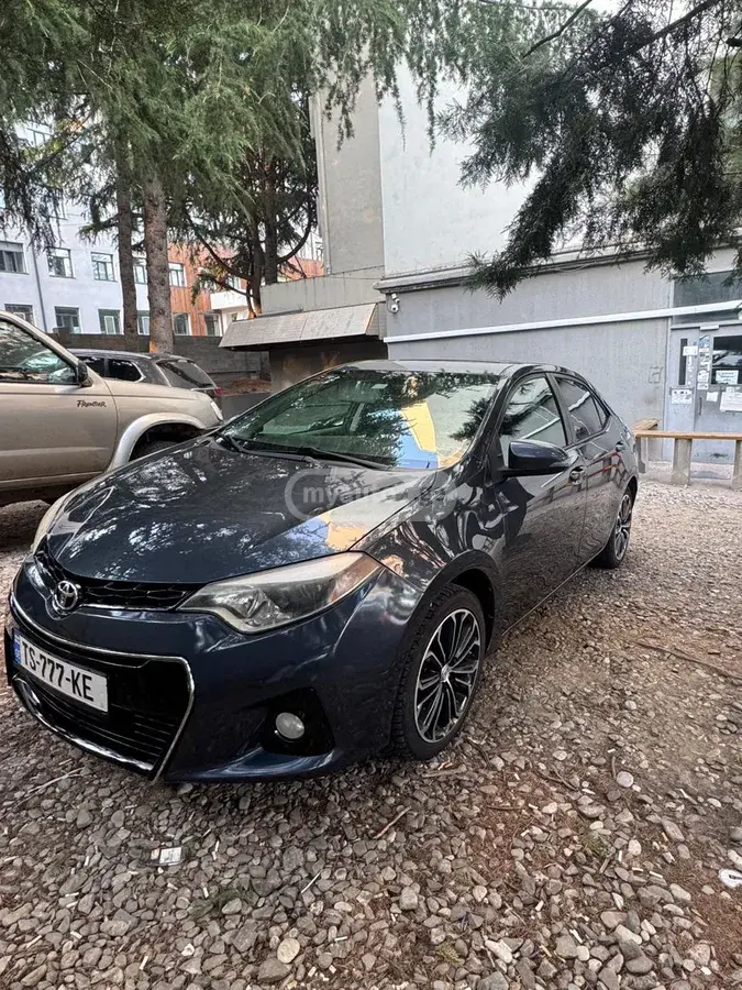 Toyota Corolla 2013 — photo 2