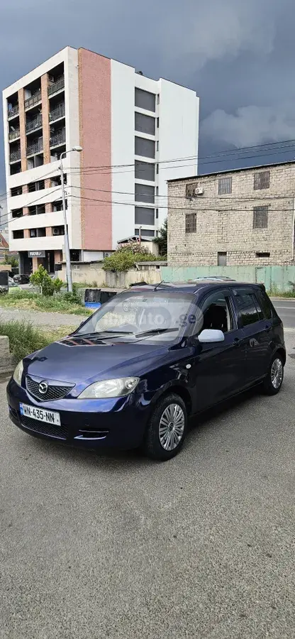 Mazda Demio 2002 — photo 2