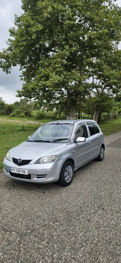 Mazda Demio 2003 — photo 2