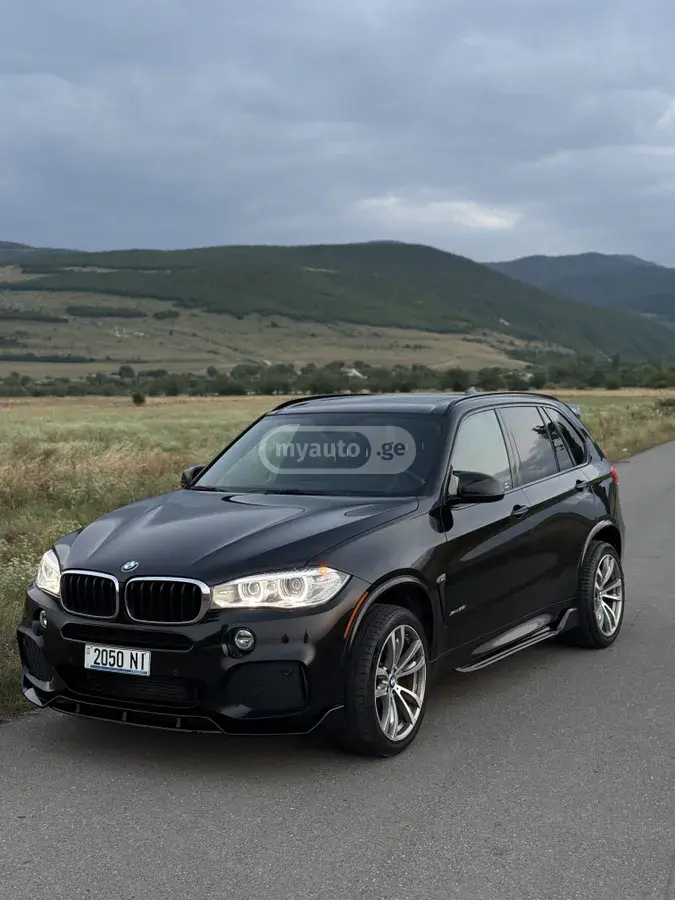 BMW X5 2015 — photo 2